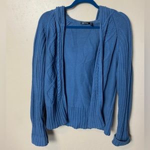 Women’s blue knitted jacket with a hoodie and a zipper